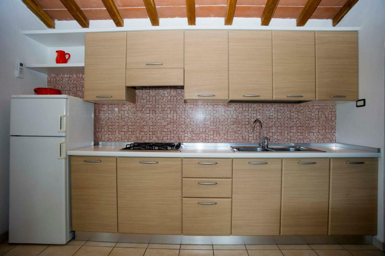 Il Poggio Marcuccio Aparthotel Лакона Екстериор снимка